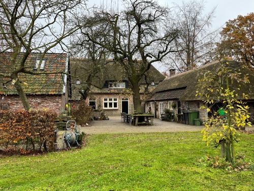achterzijde boerderij Best